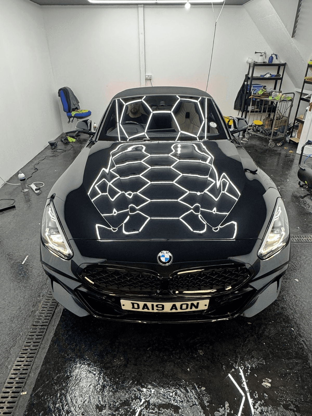 Black BMW in ES Garage with hexagonal studio lighting